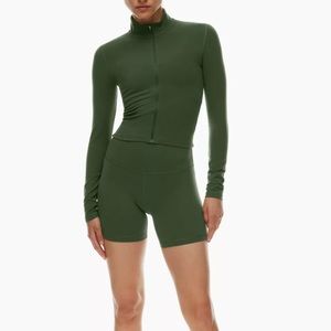 Aritzia Tnaction long sleeve zip up shirt in a kelly green color. Size XS.